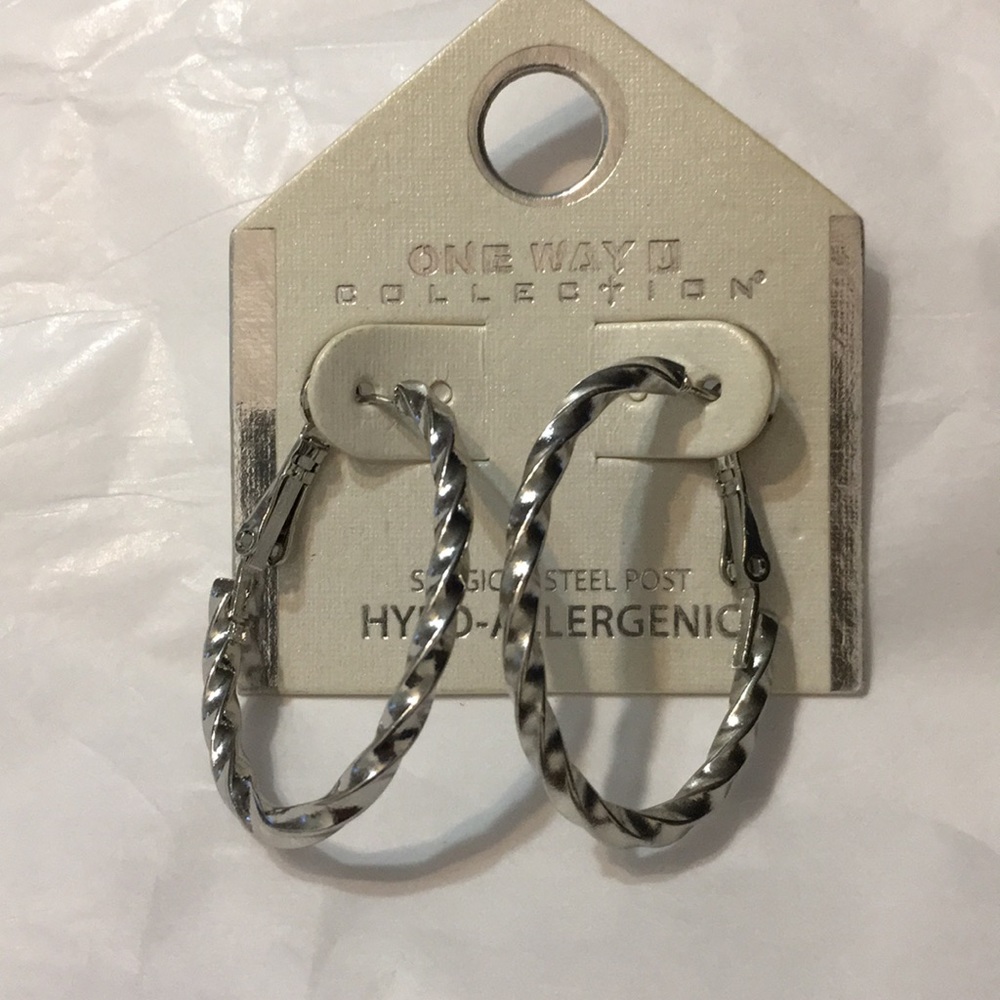 Silver twisted oval shaped hoop earrings